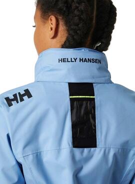 Jaqueta Helly Hansen Crew com capuz azul para mulher.