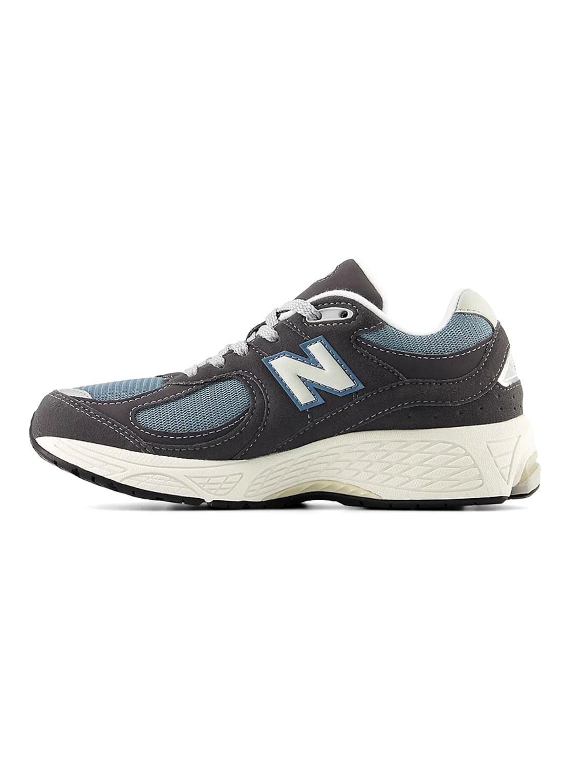 Sapatilhas New Balance GF2002 cinza para meninos e meninas.