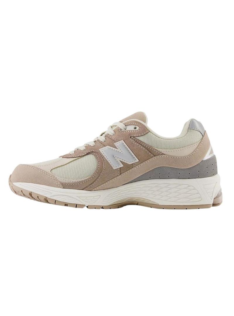 Sapatilhas New Balance M2002R bege para mulher.