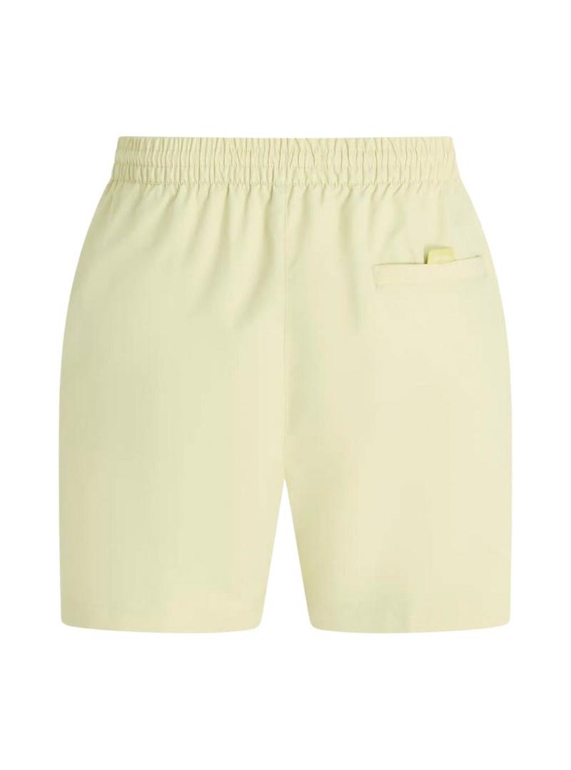 Calção amarelo com logo da Calvin Klein para homem.