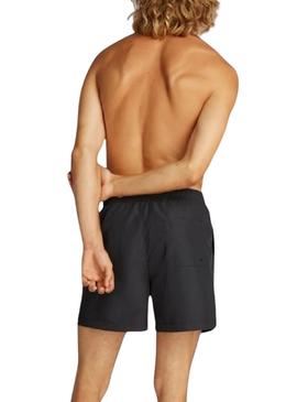 Fato de banho Calvin Klein preta com logo na frente para homem.