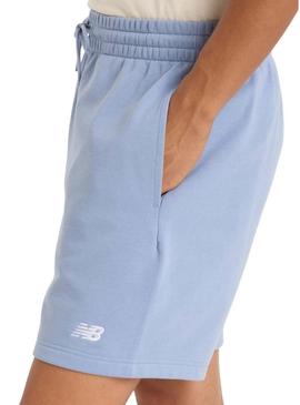 Bermudas New Balance Sport Essentials azuis para homem