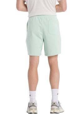 Bermuda New Balance Sport Essentials verde para homem.