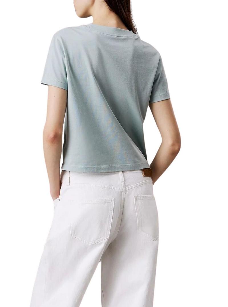 Camiseta Calvin Klein cortada azul com logotipo para mulher.