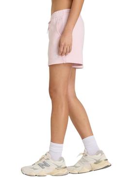 Shorts New Balance Essentials French Terry rosa para mulher.