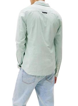 Camisa Tommy Jeans Oxford verde para homem.