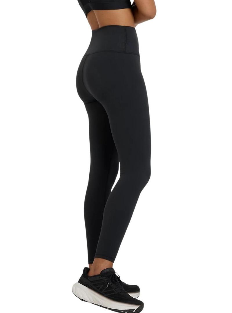 Calças justas New Balance NB Dry pretas para mulher.