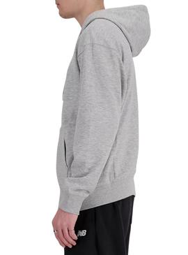 Jaqueta New Balance Sport cinza para homem.