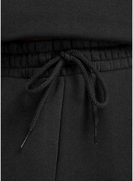 Calça New Balance Reimagined preta para mulher.