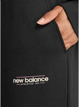 Calça New Balance Reimagined preta para mulher.