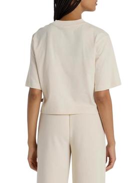 Camiseta New Balance Reimaginada bege para mulher.