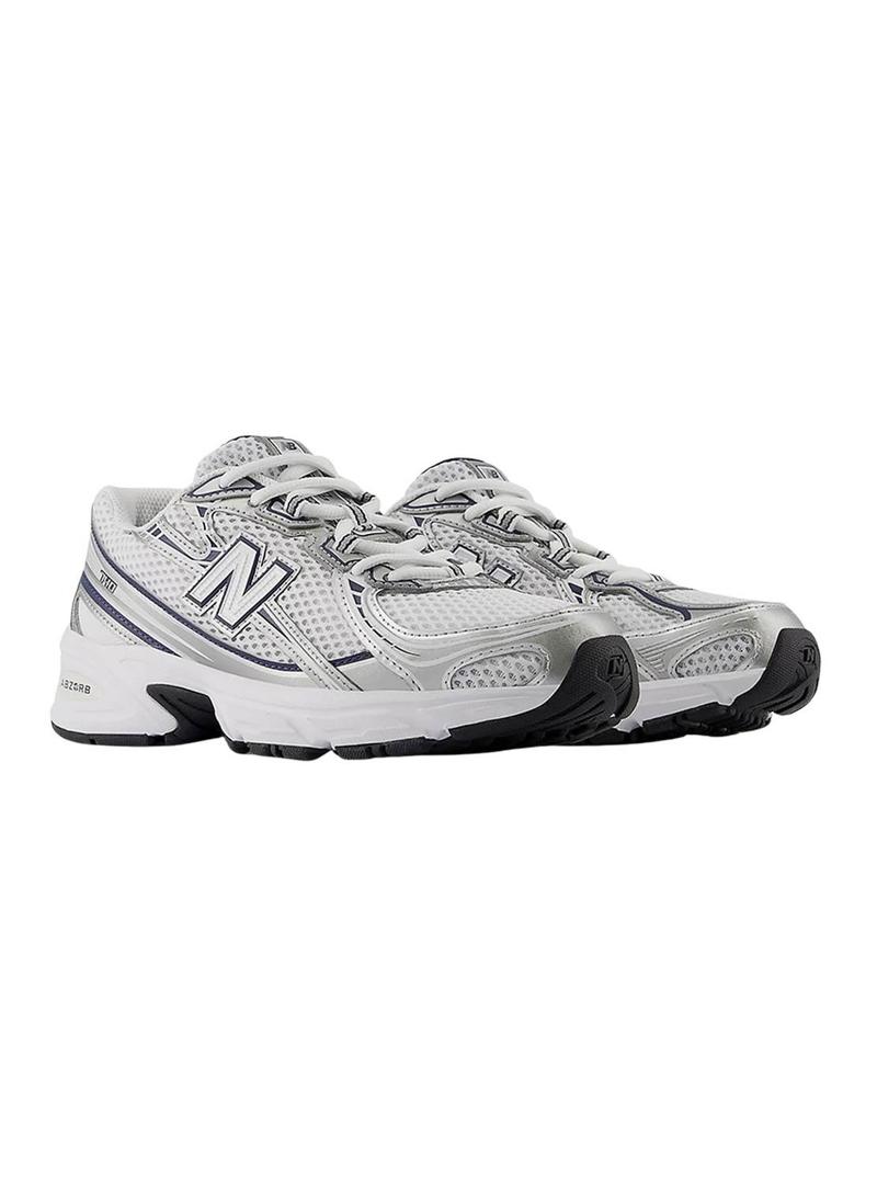 Sapatilhas New Balance 740 brancas para crianças.