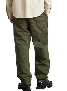 Calça Carhartt Flint verde tingida para homem.