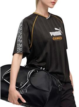 Camiseta Puma King Futebol preta para mulher.
