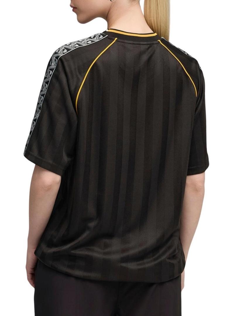 Camiseta Puma King Futebol preta para mulher.