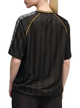 Camiseta Puma King Futebol preta para mulher.