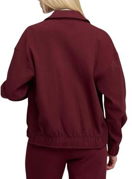 Jaqueta esportiva Puma T7 Relaxed grená para mulher.