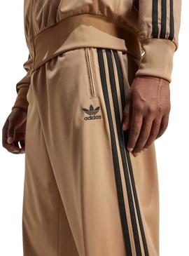 Calça Adidas Firebird caramelo para homem.