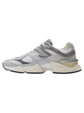 Sapatilhas New Balance U9060 brancas para mulher e homem.