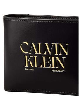 Carteira Calvin Klein Jeans Billfold preta e amarela para homem.