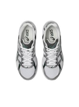 Sapatilhas Asics Gel 1130 prateadas e verdes para mulheres.