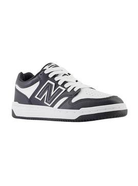 Tênis New Balance 480 preto e branco para meninos e meninas.