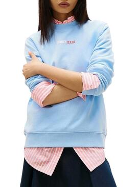 Moletom Tommy Jeans Essential logo azul para mulher.