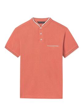 Polo de coral com bolso para criança.