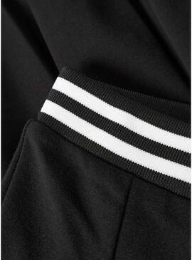 Saia Name It preta de voo com cintura elástica para menina.