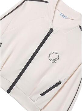 Jaqueta esportiva Mayoral bege para menina.