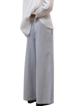 Calça Ecoalf Moss listrada azul e branca para mulher.