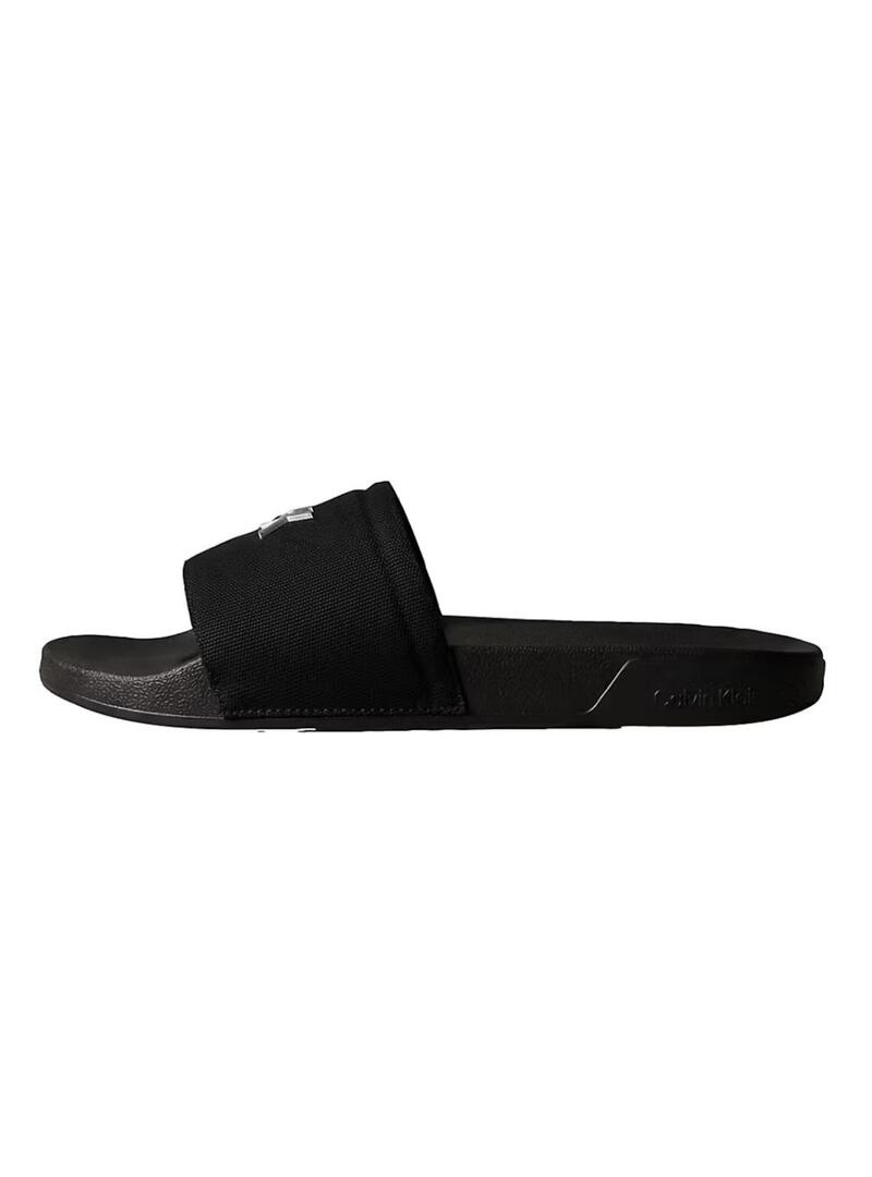 Sandálias Calvin Klein Jeans Slide Canvas preto para mulher.