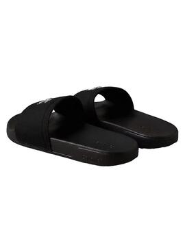Sandálias Calvin Klein Jeans Slide Canvas preto para mulher.