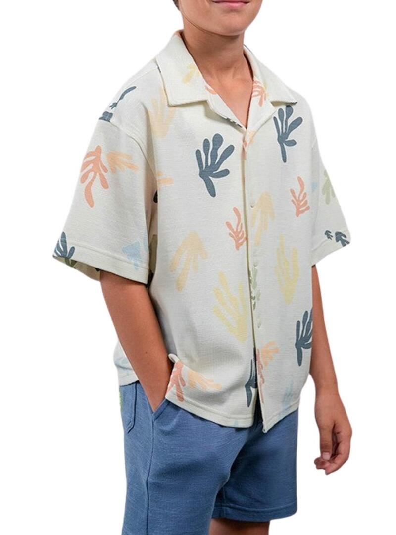 Camisa de malha estampada em creme.