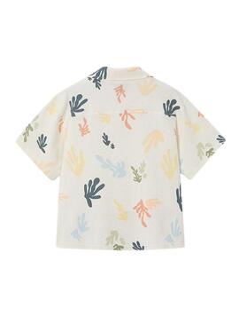 Camisa de malha estampada em creme.