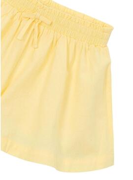 Saia-calça fluída amarela Mayoral para menina.