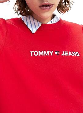 As calças de brim de Tommy vestem o logotipo Heart